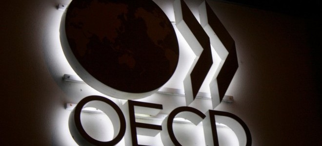 OECD küresel büyüme öngörüsünü düşürdü