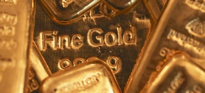 Ons altın son 1,5 ayın en kazançlı haftalık kapanışına yöneldi